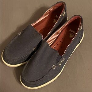 Crocs women’s Navy Canvas Slip-On Shoes size 7